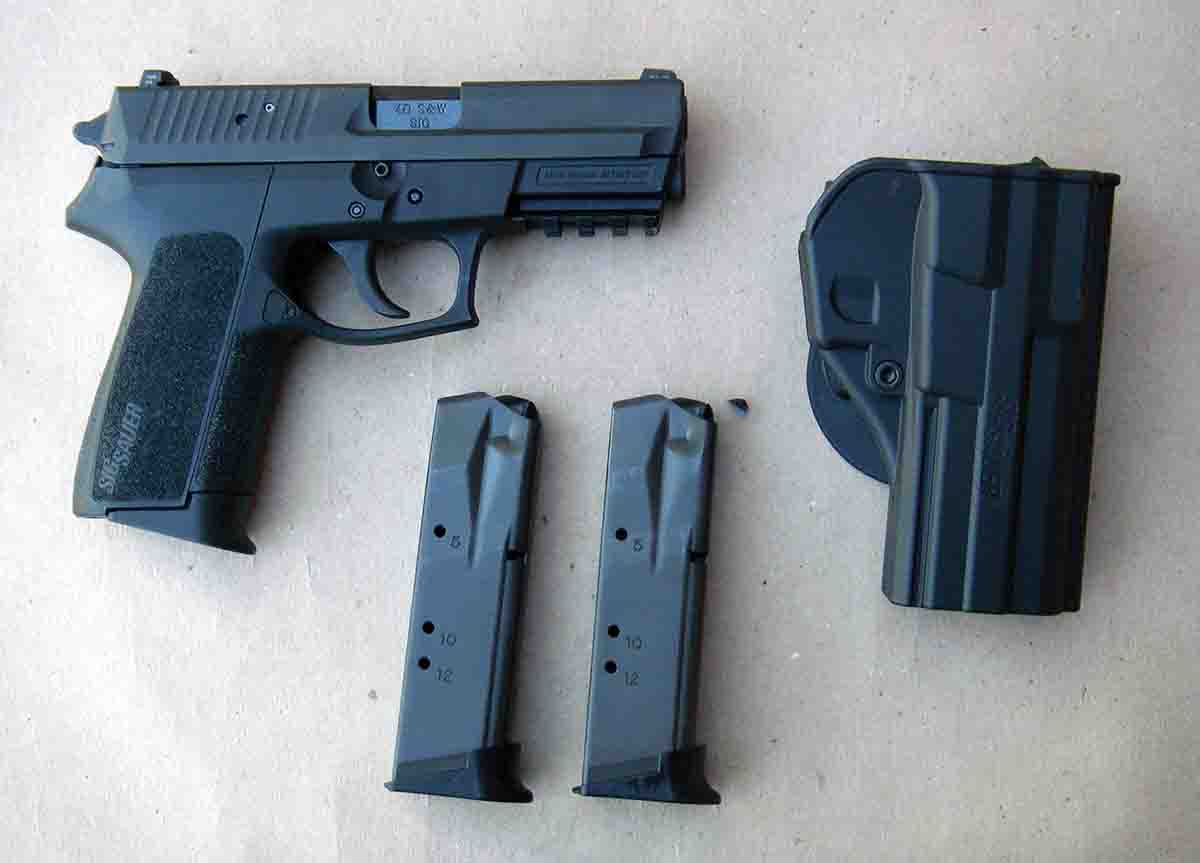 The SP2022 is supplied with three magazines and a molded holster.